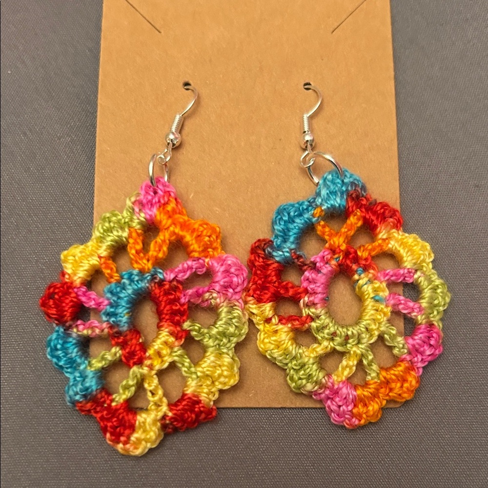 Homemade crocheted dangly earrings.
